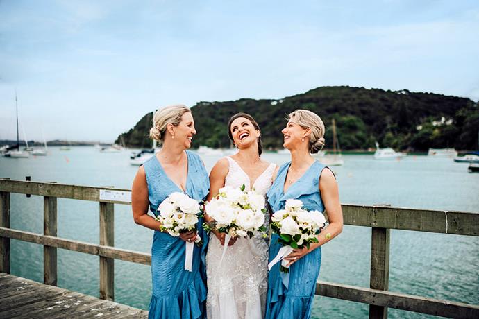 Bridesmaids Jade Silvester (left) and Sheree Ricketts wore frocks by Kelly Coe from Augustine.