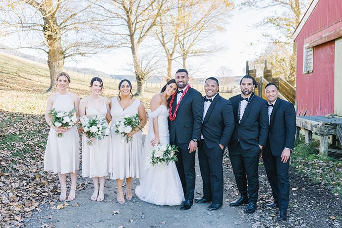 The blissful bride and groom with bridesmaids Sian Furniss, Jamie Welch and Awhina Karawana, and groomsmen Junior Tyrell, TJ Asiata and Vincent Feausi.