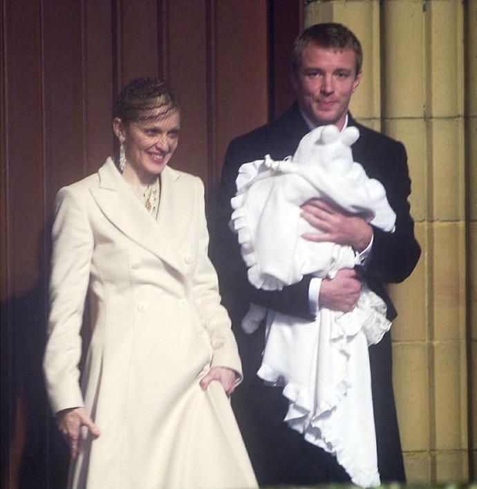 Madonna and Guy Ritchie with Rocco at his baptism in 2000. Photo: Getty