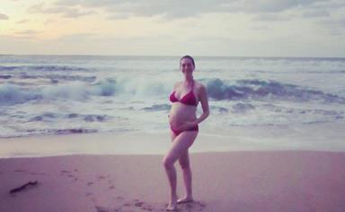 Anne Hathaway embraces pregnancy with bikini photo