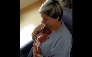 The moment a mother holds her premature baby for the first time