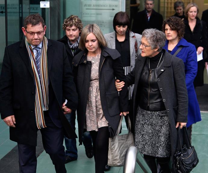 Guy (centre) her father Bryan (left) and mother Jo (right) leave court following Macdonald’s acquittal