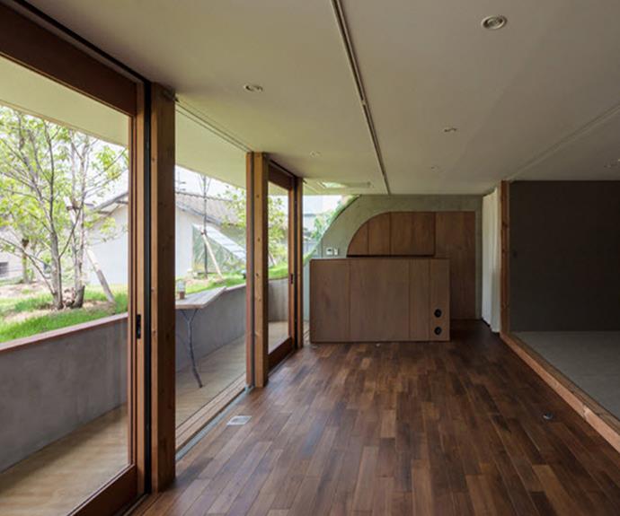 Rough-looking dark timber floors add to the environment's natural aesthetic. Photo: Courtesy of Keita Nagata Architectural Element