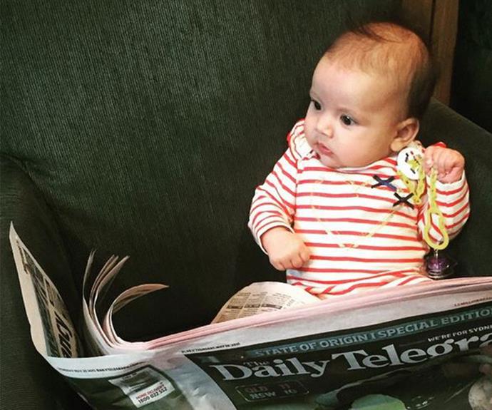 "Catching up with today's news in the qantas lounge while waiting for my flight!," celeb Manu Feildel  joked alongside this snap of daughter Charlee.