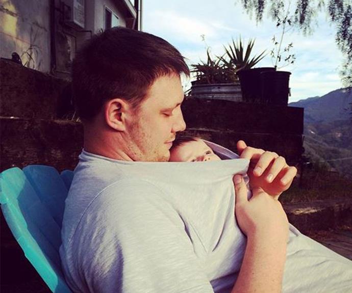 Australian supermodel Robyn Lawley shared this precious snap of her daughter Ripley and partner Everest Schmidt. "Keeping warm... Watching sunset," she wrote.