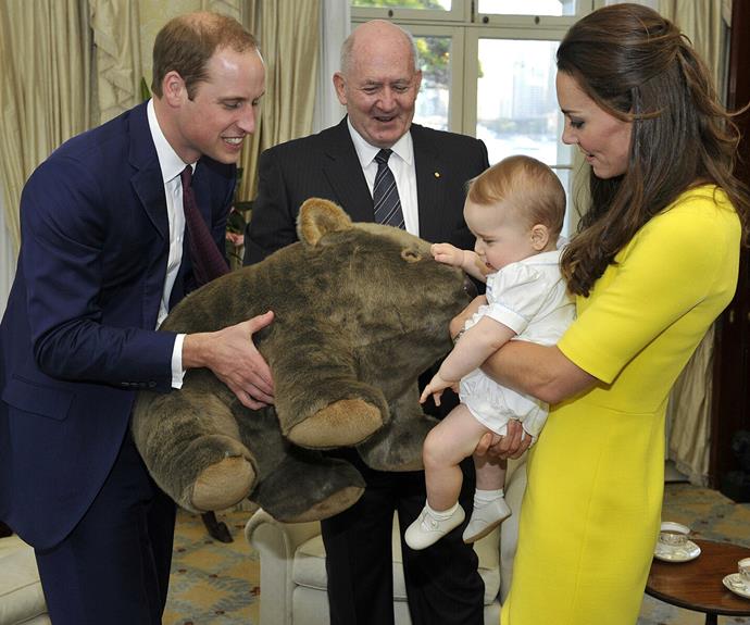 Wills, Kate and George share a laugh after the little Prince is gifted an enormous wombat from the Governor-General of Australia, Sir Peter Cosgrove at Sydney's Admiralty House in April 2014.