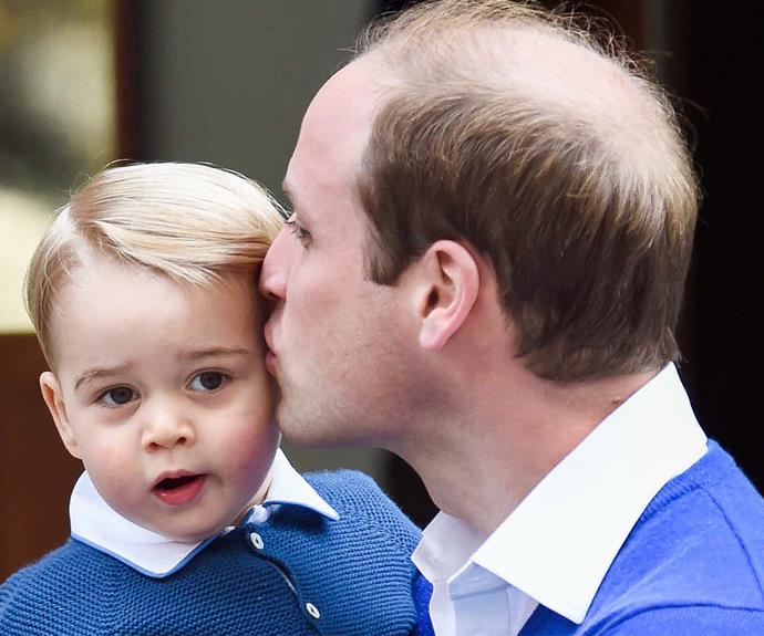 William places a loving kiss on George as they head into St Mary's hospital, London to introduce the young Prince to his new sister, Princess Charlotte.