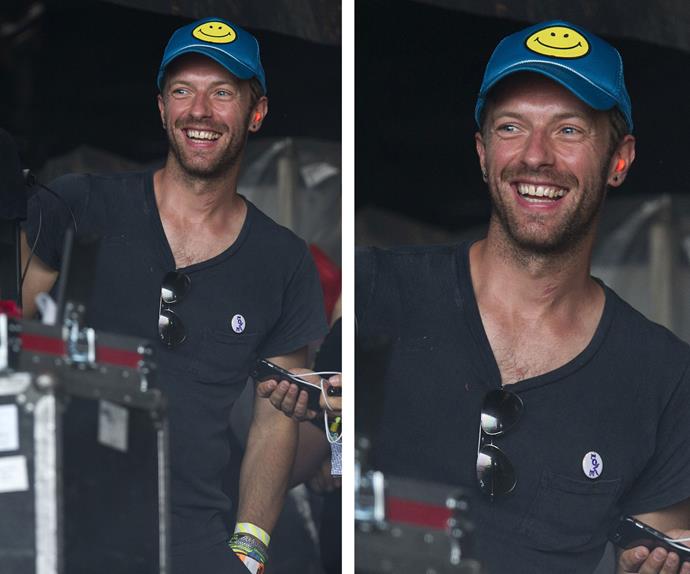 Chris Martin has plenty to smile about these days thanks to rumoured romances with the likes of Kylie Minogue and Jennifer Lawrence, the Coldplay front man watched Pharrell perform from the side of stage.