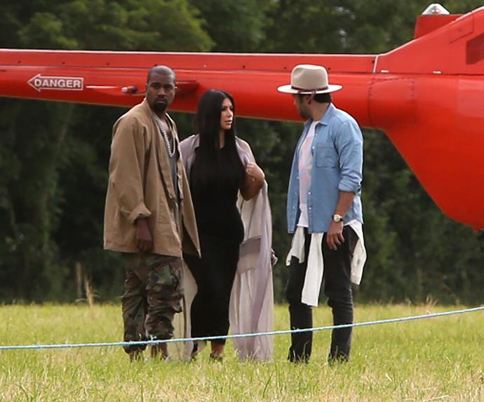 Kim Kardashian and Kanye West were not interested in the soggy ground of Glastonbury, as they made their entrance via helicopter.