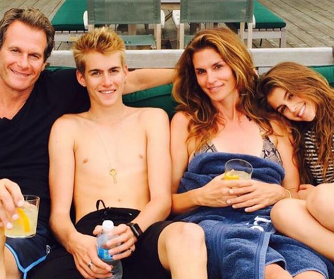 Cindy Crawford with her model family. You'd be forgiven if you confused this portrait for a Polo Ralph Lauren ad! Hubby Rande, son Presley and her mini-me Kaia enjoyed a dip in the lake.