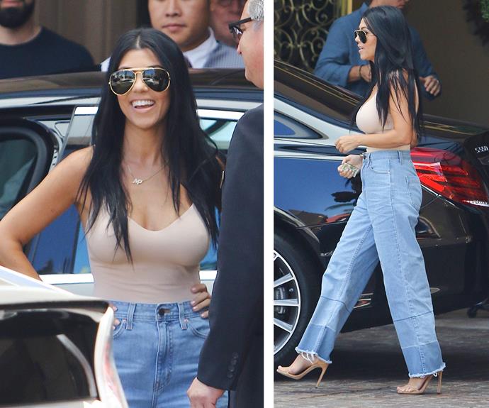 Kourt flashes her tiny waist in a plunging nude top during an outing to Beverly Hills. The reality star balanced out the figure-hugging tank with a pair of denim flares while her over-sized aviators added a retro touch.