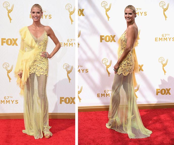 Hello, Heidi! The leggy supermodel brightens up the day with her sunny smile and this sheer canary-yellow frock which shows off  her iconic pins thanks to the see-through dress.
