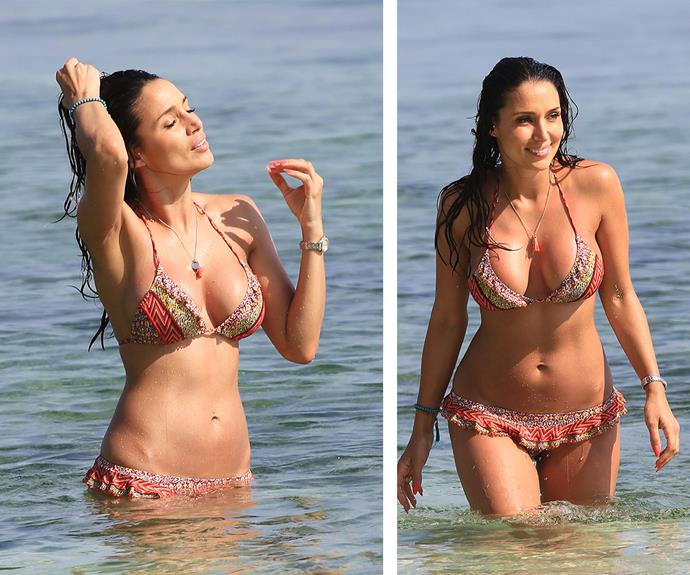 Work it, Snez! The reality star showed off her concave stomach and svelte physique as she emerged from the waters.