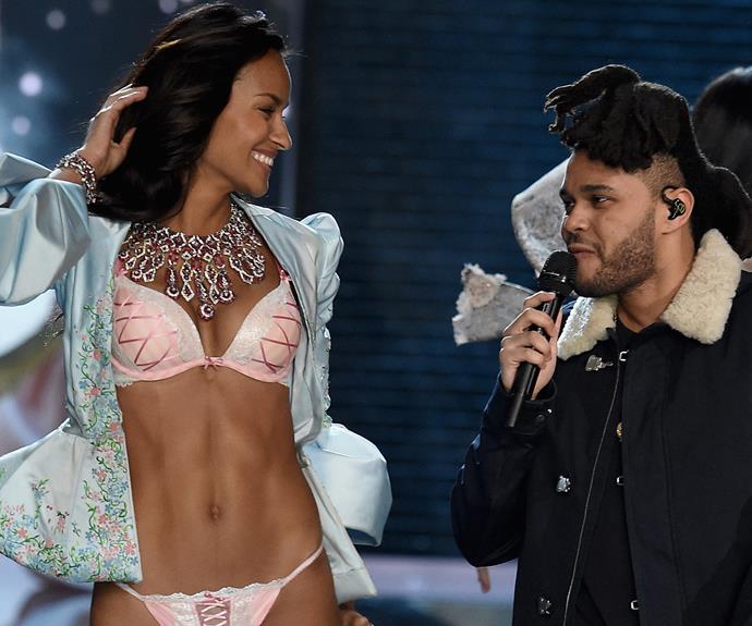 It's not a Victoria's Secret Fashion show without major flirting between the musical guest and models. The Weeknd was the lucky guy who got to share the stage with the leggy beauties.