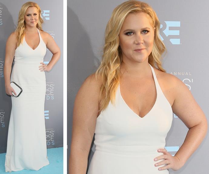 The girl of the moment, Amy Schumer dazzled in a fitted white halter dress. Can we take a moment for her on point curves!