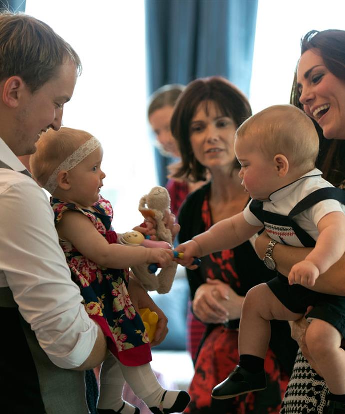 Prince George, seen here with mum Catherine in New Zealand, loves playing with other kids.