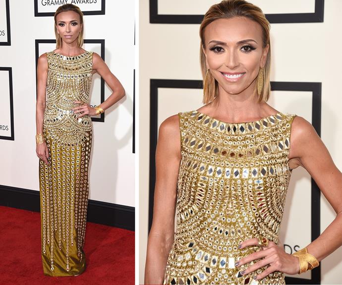 Golden girl! *E!* host Giuliana Rancic dazzled in an embellished floor-length gown by Jani & Khosla which she teamed with slicked-back hair.