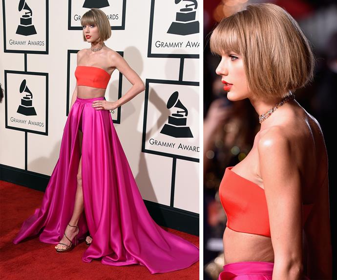 The breathtaking Taylor Swift showed off brand new 'do! We're coveting the cropped bob along with her bright pink maxi-skirt and hot orange bandeau.