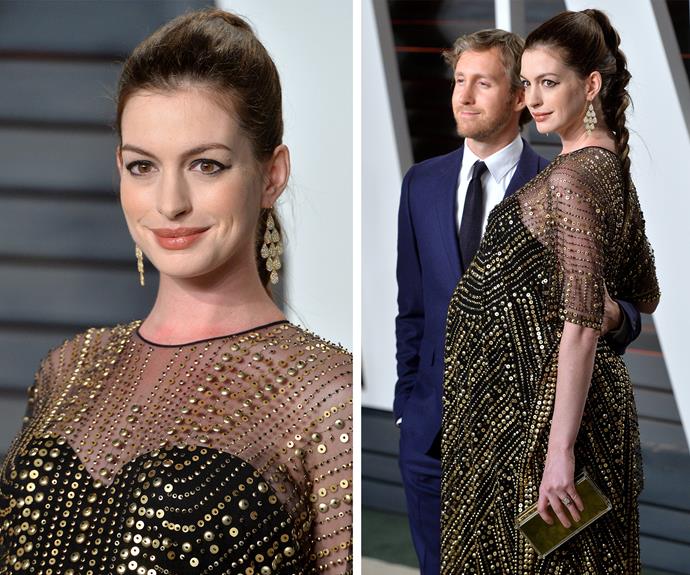 Anne Hathaway dressed her baby bump to the nines channeling an Egyptian goddess.