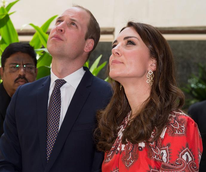 To think the royal pair flew in that morning after a nine hour flight! Looking bright and alert, Wills and Kate kicked off their week stay by heading to the Taj Mahal Palace Hotel, where they paid tribute to those who died in the 2008 terror attacks.