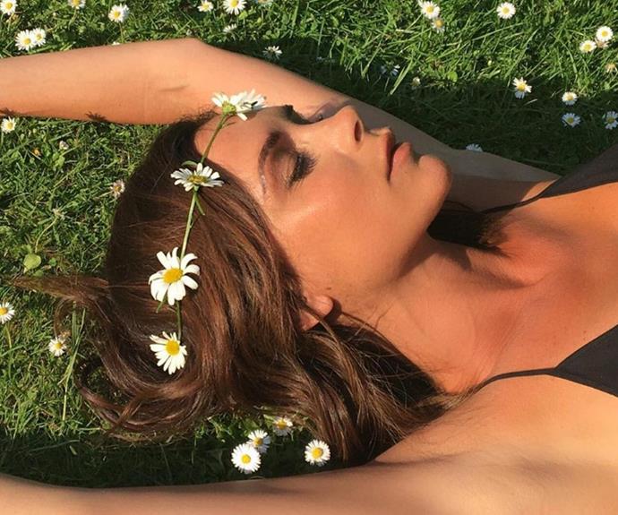 Take a moment to lie in the grass like Victoria Beckham.