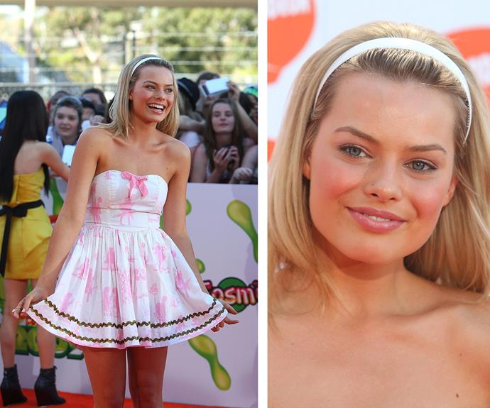 Donning a tiny nose stud, the starlet opted for a baby pink and white frock for the 2009 Australian Nickelodeon Kids' Choice Awards.