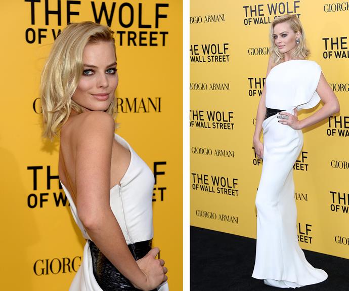 The New York City premiere of *The Wolf of Wall Street* was one of Margot's defining Hollywood moments, and boy did she shine in this one-shouldered white gown. **Find out the star's secret to her flawless New York accent in the next slide!**