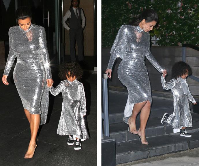 Kim Kardashian and her three-year-old daughter, North West, have stepped out in matching disco ball dresses for Kanye West's concert at Madison Square Garden in New York City. **Watch the mother-daughter duo dance to his music in the next slide! Gallery continues after clip...**