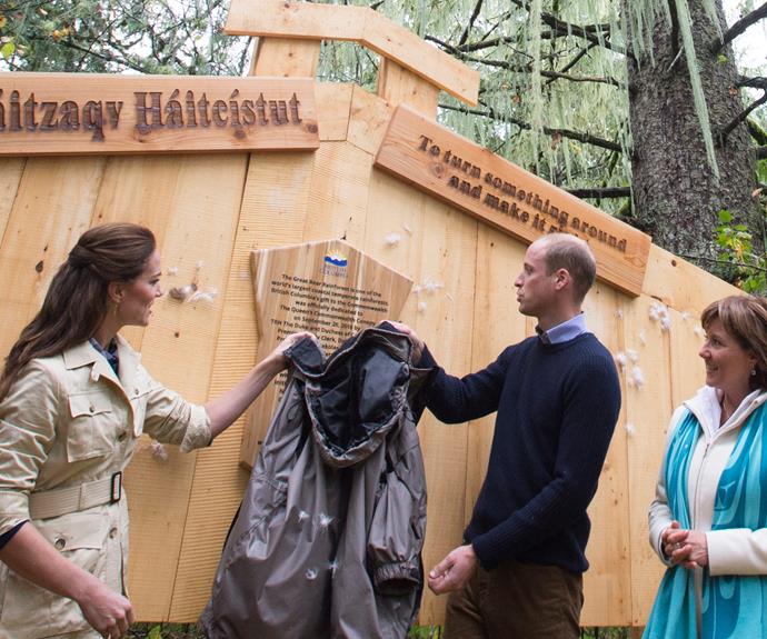 The Duke and Duchess unveil a new plaque in the forest.