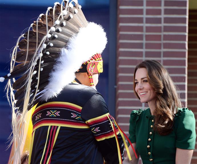 The Duchess is greeted by a leader at the University of British Columbia.