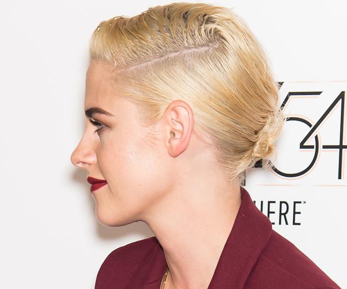 Kristen wore her new style slicked back with a side parting to make the most of her features and her strong lip.